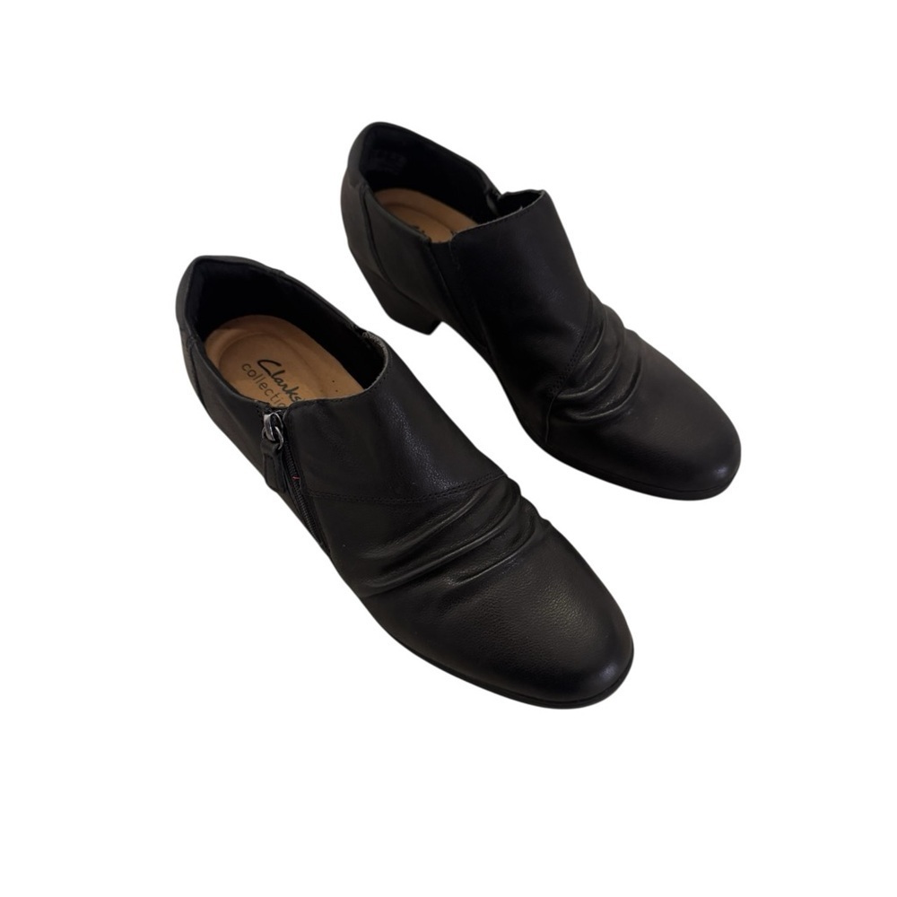 Clarks women’s Emily 2 Braley Leather Slip-On Ankle booties with Side Zip